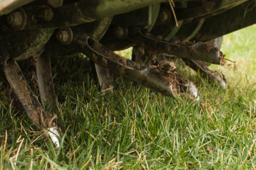 the spokes on a lawn aerator